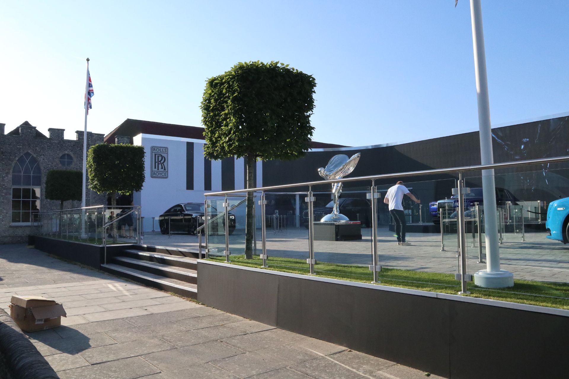 large cube feature tree infront of building
