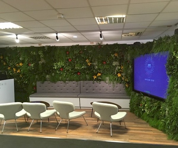 Living Wall with television screen in the middle at event