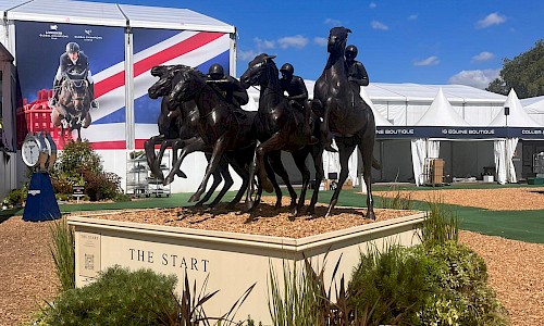 Longines Global Champions Tour charging horses sculpture with plants surround