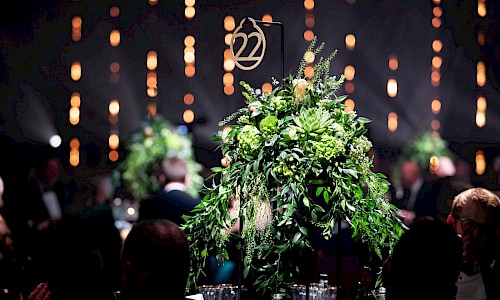 JLR Retailer of the Year large green table display on stands