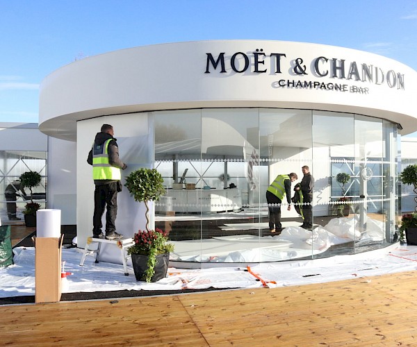 workers building event bar structure