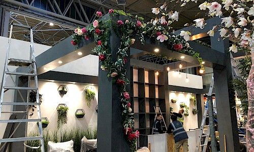 January Furniture Show artificial planting on exhibition stand