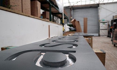 January Furniture Show carpenters building in warehouse