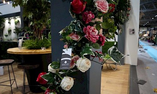 January Furniture Show artificial climbing florals planting on exhibition stand